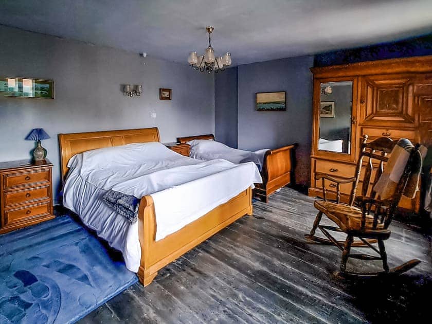Morning mist family bedroom. With king-size and single beds. | Brockhill House, Beaminster