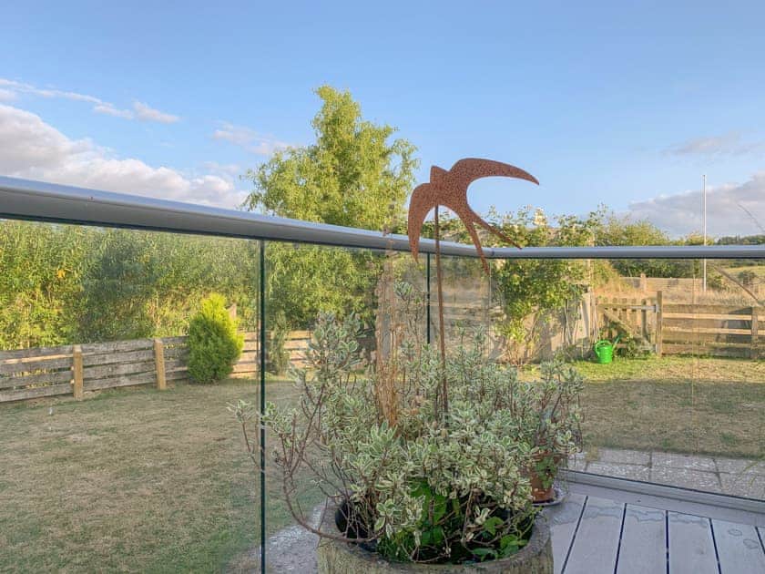 Raised terrace with garden views | Woodlands View, Thorncombe, near Broadwindsor