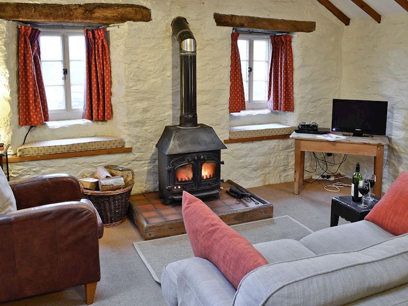 Living Room with wood burner | Rhydlanfair Cottage, Near Betws-y-Coed