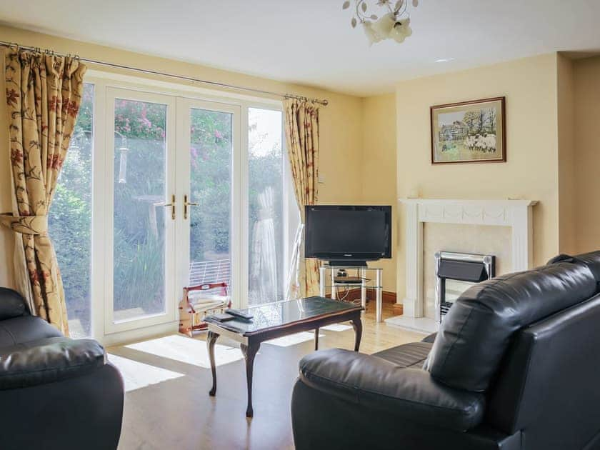 Living room | Dairyman’s Cottage - Millmoor Farm, Bickley, near Malpas