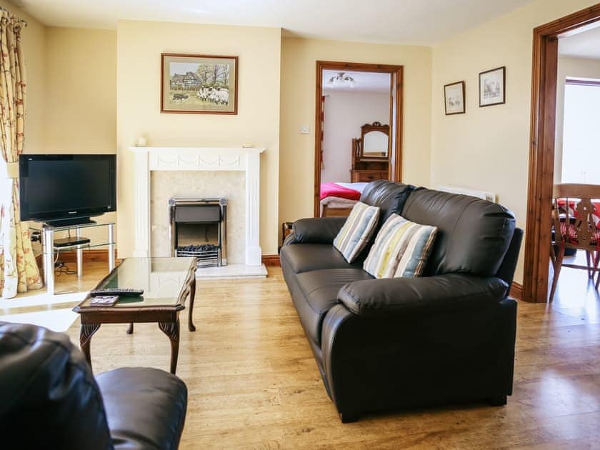 Living room | Dairyman’s Cottage - Millmoor Farm, Bickley, near Malpas