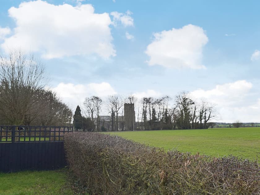 The porperty enjoys fine views over the rolling Suffolk countryside | Blueberry Cottage, Debenham, near Framlingham