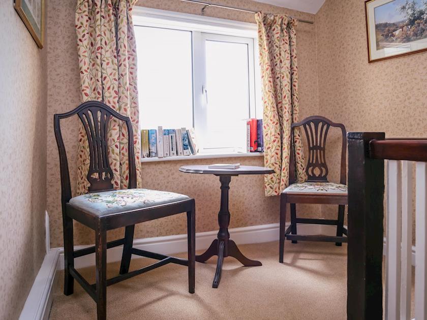Quiet seating area on landing | Farmhouse Wing - Millmoor Farm, Bickley, near Malpas 