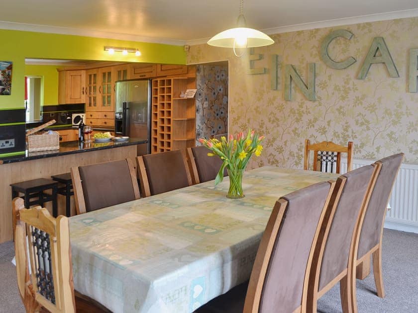 The proximity of the large kitchen to the dining area allows for easy stressfree mealtimes | Carreg Y Garth Isaf, Rhiwlas near Bangor
