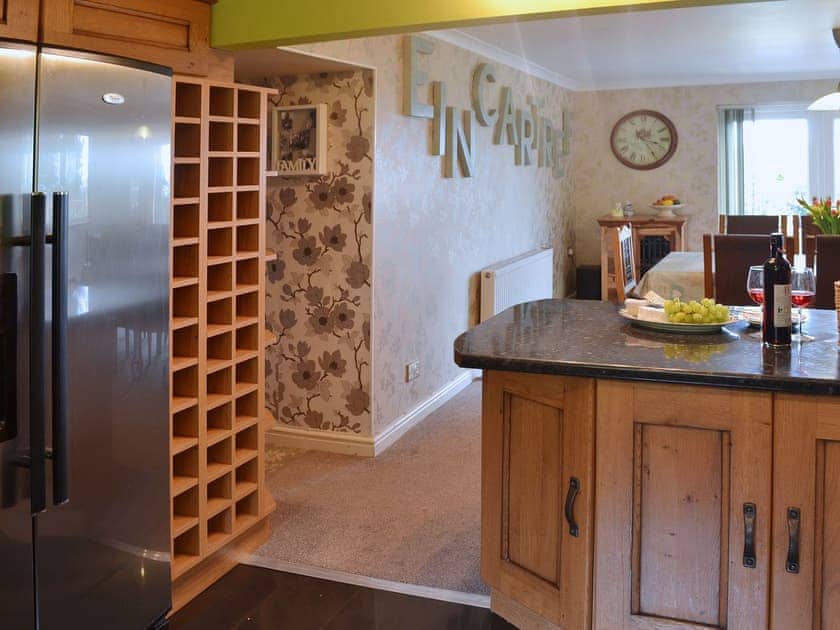 Modern appliances sit side by side with more traditional kitchen furniture | Carreg Y Garth Isaf, Rhiwlas near Bangor