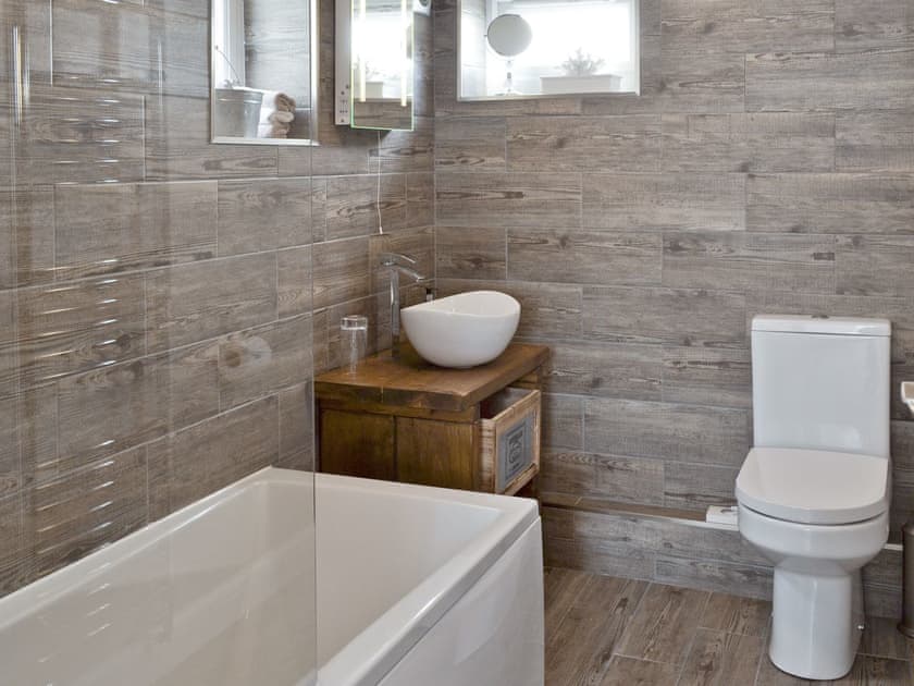 Modern family bathroom with shower over bath | Willow Tree Cottage at Cottage Farm - Cottage Farm, Foxholes, near Scarborough