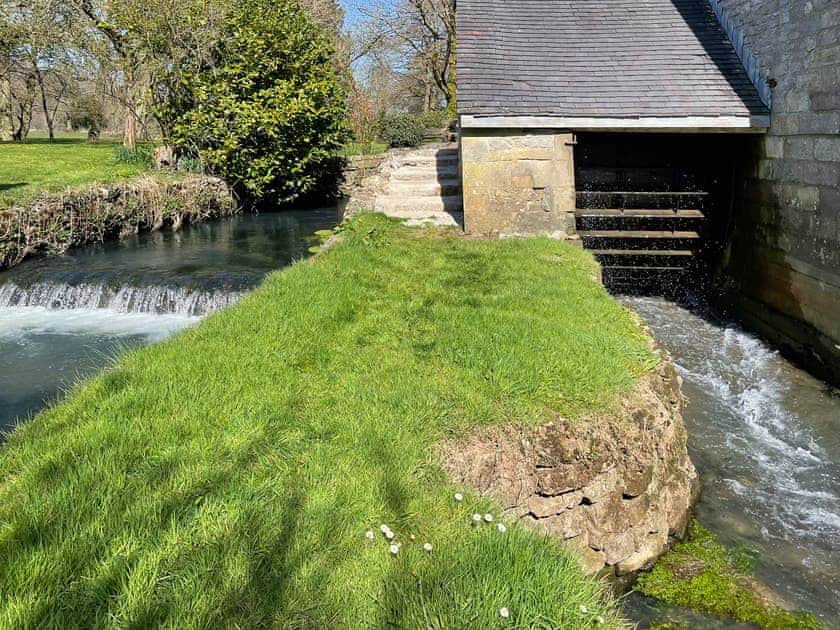 The restored mill wheel  | The Old Mill Annexe, near Hartington