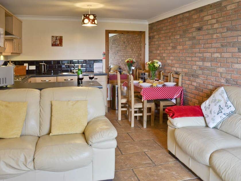 Attractive open-plan multi-purpose room | Hoggard Cottage - Filey Holiday Cottages, Filey