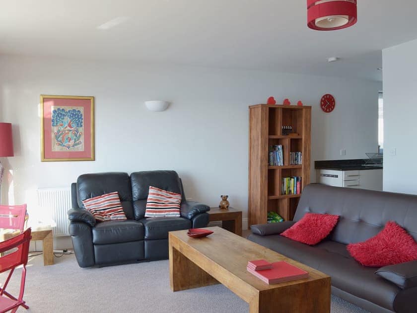 Comfortable leather sofas and contemporary furnishings add the the air of relaxation | Apartment 6 - Astor House, Torquay