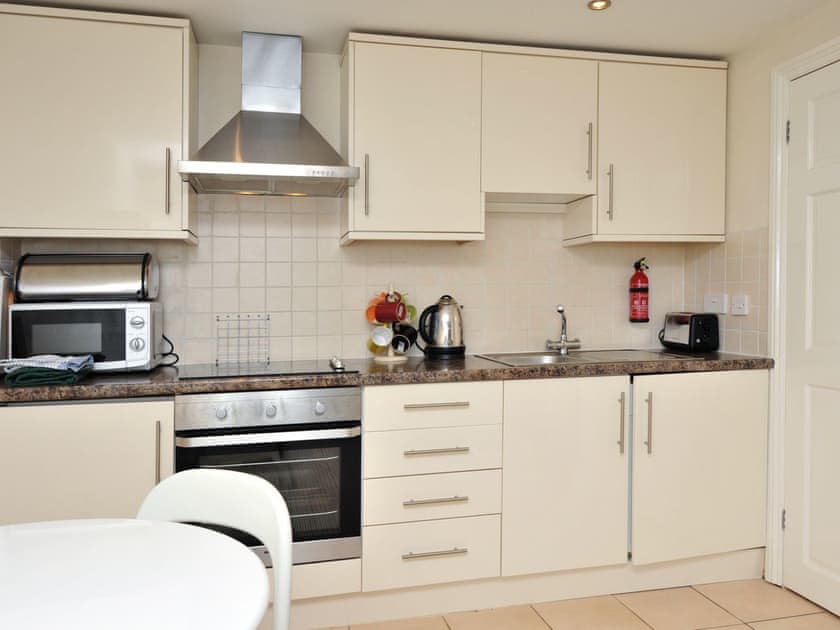 Well-equipped kitchen and convenient dining area | Trinity Apartment 34 - Trinity Mews, Torquay