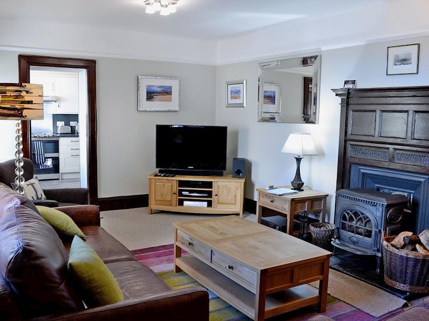 Spacious living room with woodburner | 2 Girdleness Lighthouse, Aberdeen