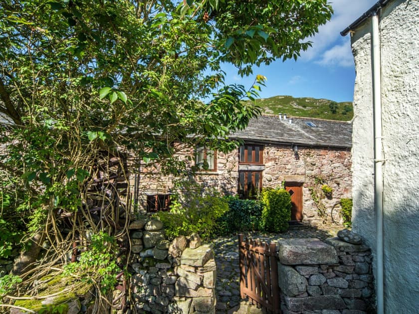 Charming stone-built cottage exterior | Hardknott Cottage - Bridge End Farm Cottages, Boot, near Eskdale
