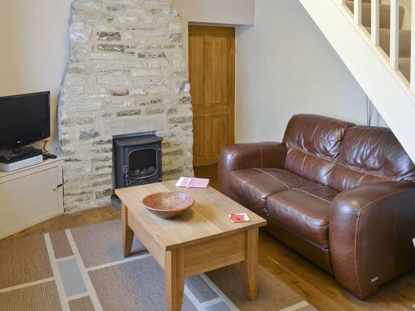 Cosy lounge with clean, convenient wood burner effect electric fire | Willow Cottage, Wolsingham