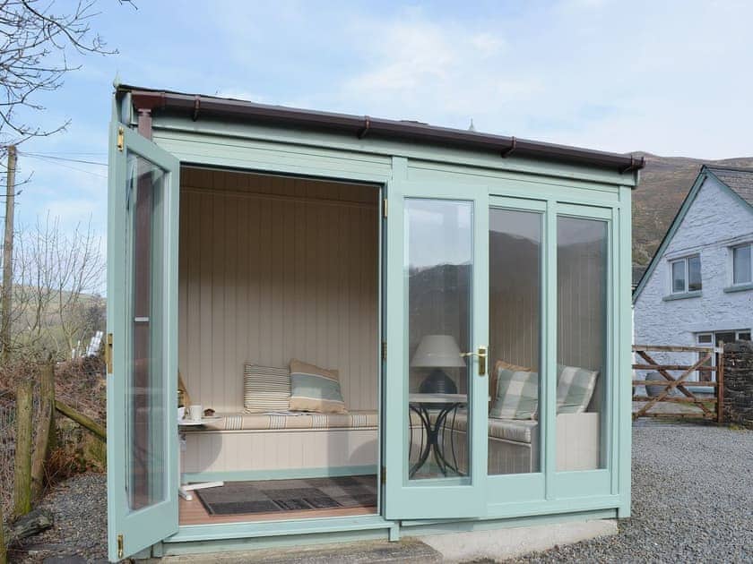 Gaze out across the Cambrian Mountains from the shelter of the beautiful garden room | Ty Mari - Ty Mari-Penroc, Cwmystwyth, Aberystwyth