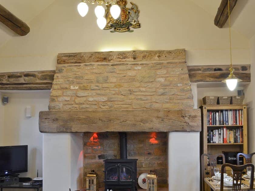 Traditional character features, wood beams and stone fireplace | The Barn at Woodland View, Barlow, near Chesterfield