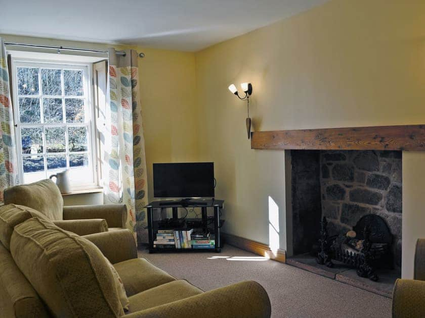 Homely living room | Waulkmill Cottage, Carronbridge near Thornhill