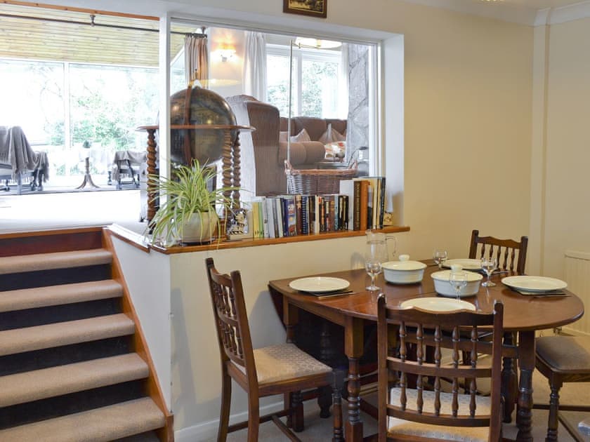 Lower level dining area with steps to large lounge and sunroom | Tucstan, Constantine, near Falmouth
