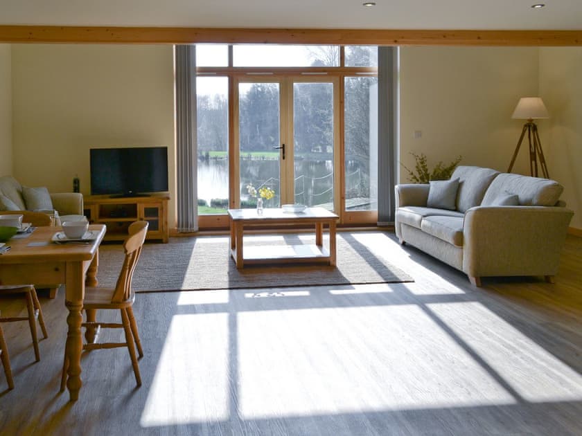 Lakeside views from the living room | Kingfisher Lodge - Springwater Lakes, Hainford, near Norwich