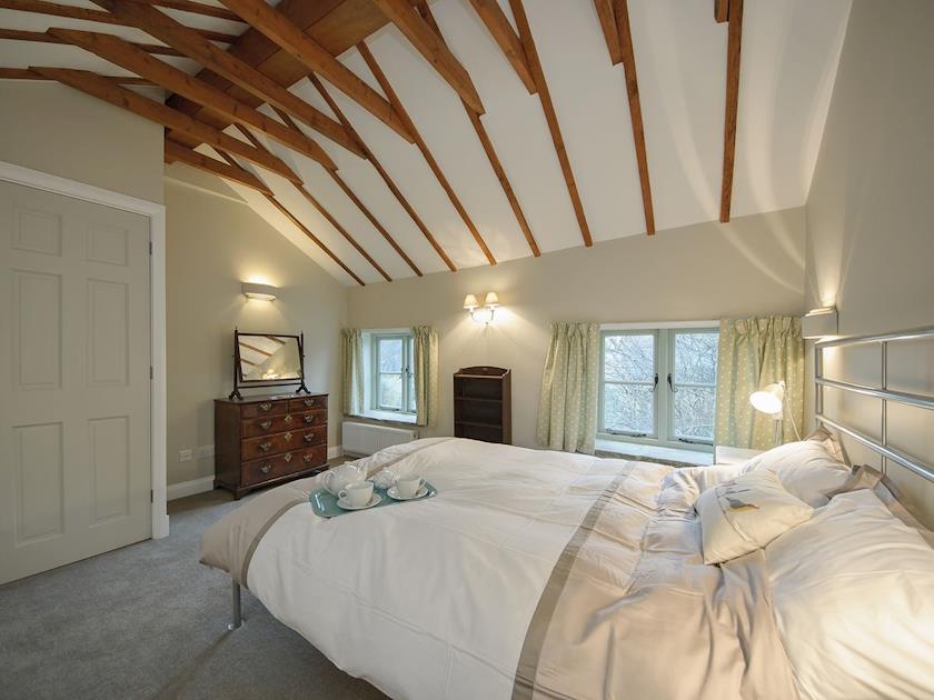 Large beamed double bedroom  | Holliers Cottage, Middle Barton, near Chipping Norton