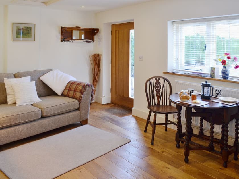 Traditional sits alongside contemporary in the living/dining room | The Gardener’s Cottage - Canterbury Cottages, Shatterling, near Canterbury