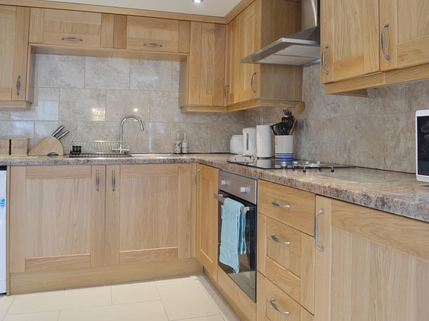 Well equipped throughout, the kitchen is clean and bright | Yr Wyddfa - The Old School, Caeathro, Caernarfon