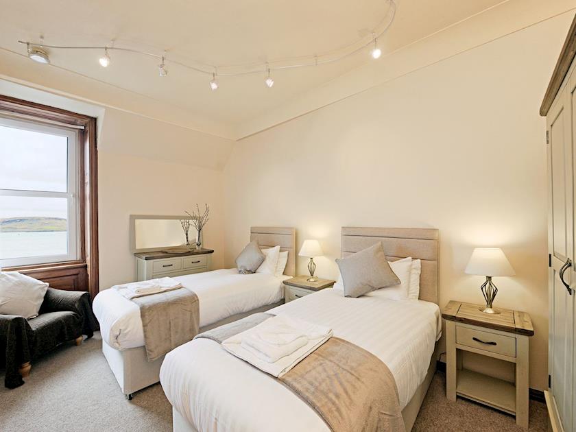 Cosy twin bedroom with sea views | Argyll Mansions, Oban