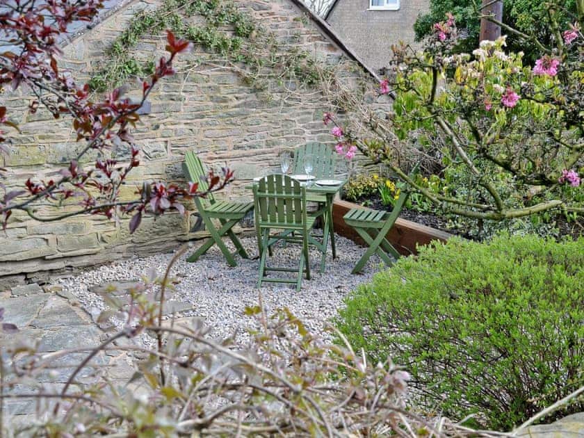 Quaint courtyard with sitting-out area and furniture | The Barn at Woodland View, Barlow, near Chesterfield