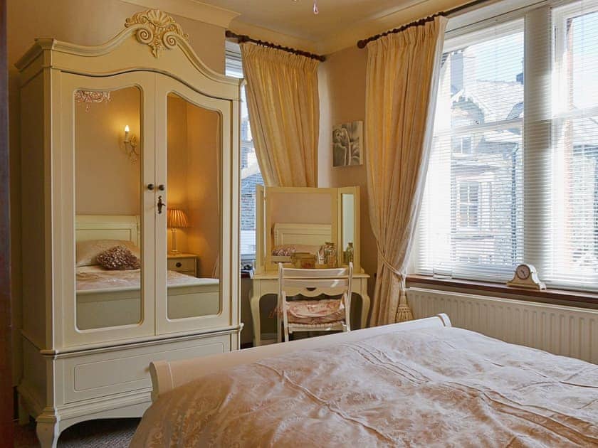 Chic furniture and elegant furnishings lend an air of sophistication to teh double bedroom | Oak Lea, Keswick