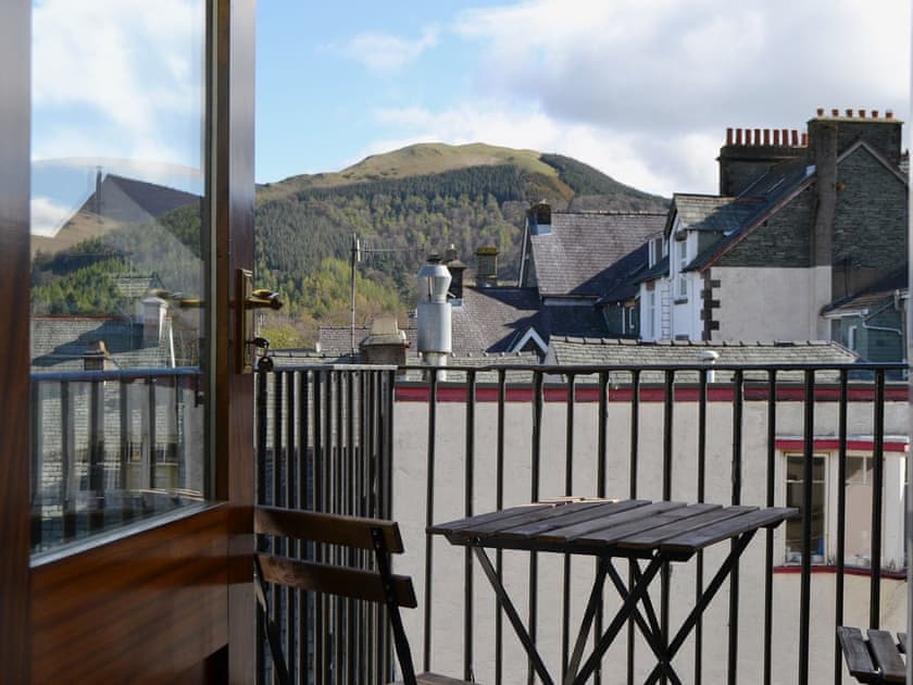 The balcony accessed from the living/dining room has spectacular views of Skiddaw and Latrigg | Fellside - Royal Oak House - Royal Oak House, Keswick