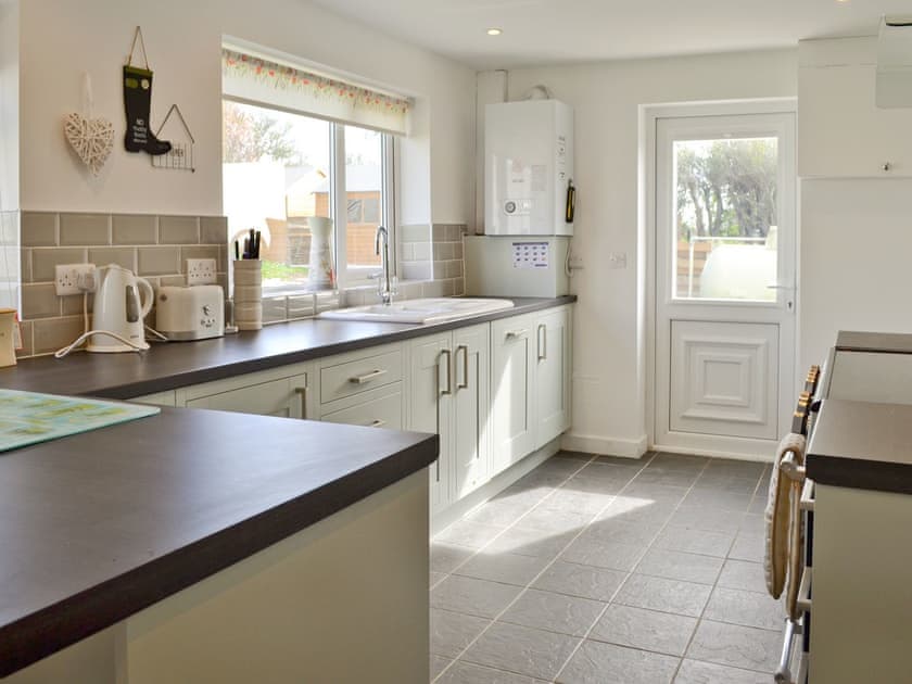 Spacious fitted kitchen | Penteryfn, near Holyhead, Isle of Anglesey