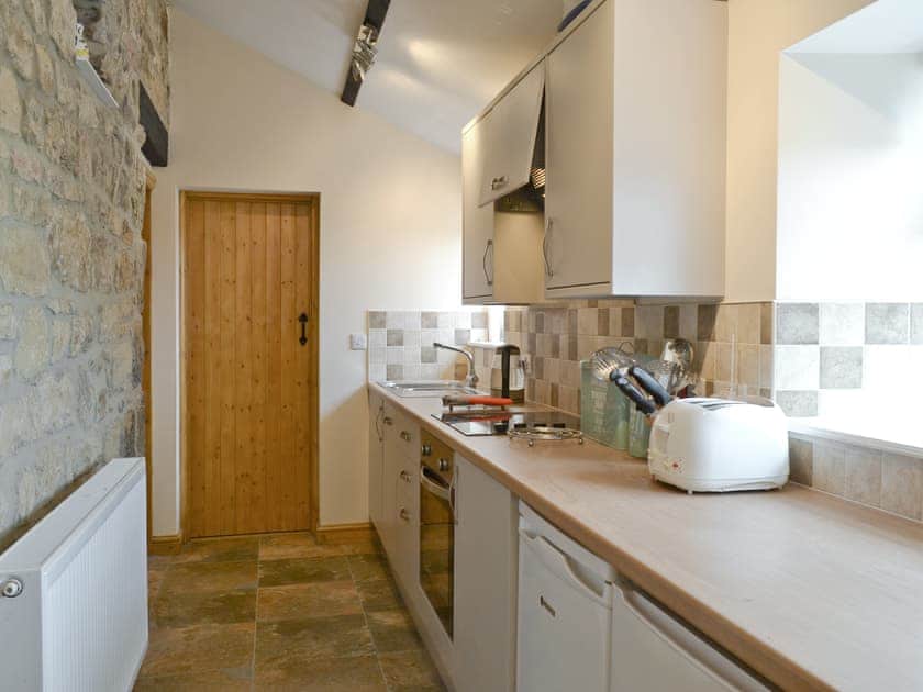 Galley style fitted kitchen | Curlew Cottage, Belford, near Bamburgh