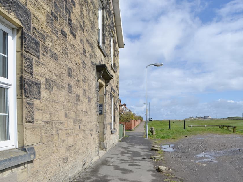 The house is set at the end of a row of houses close to the centre of town | Island View, Amble