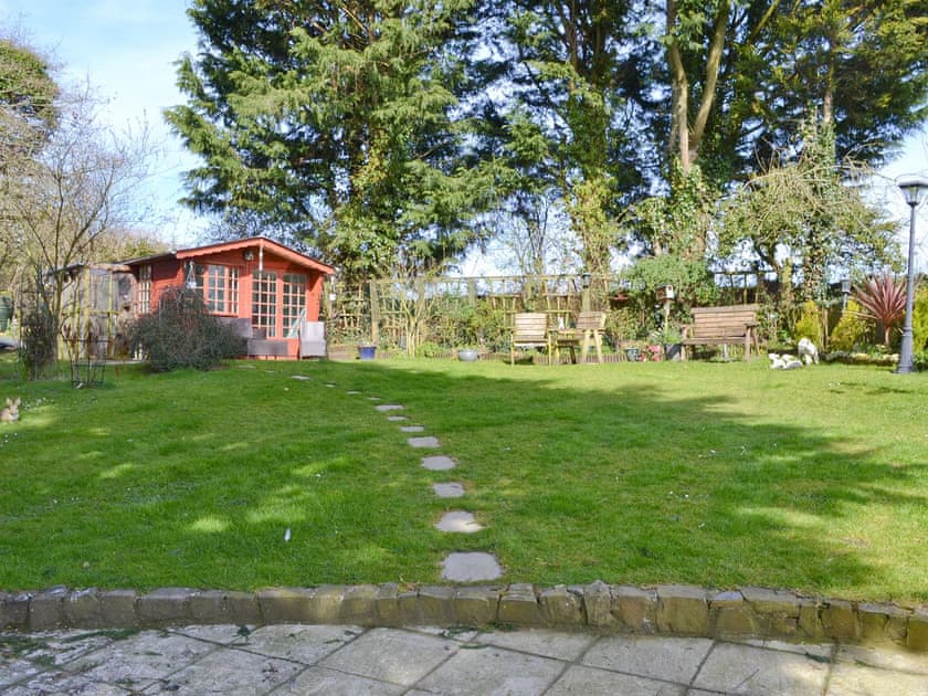 Guests are welcome to use the well-kept beer garden  | The Bridge Inn Apartment, Bridgerule, near Bude