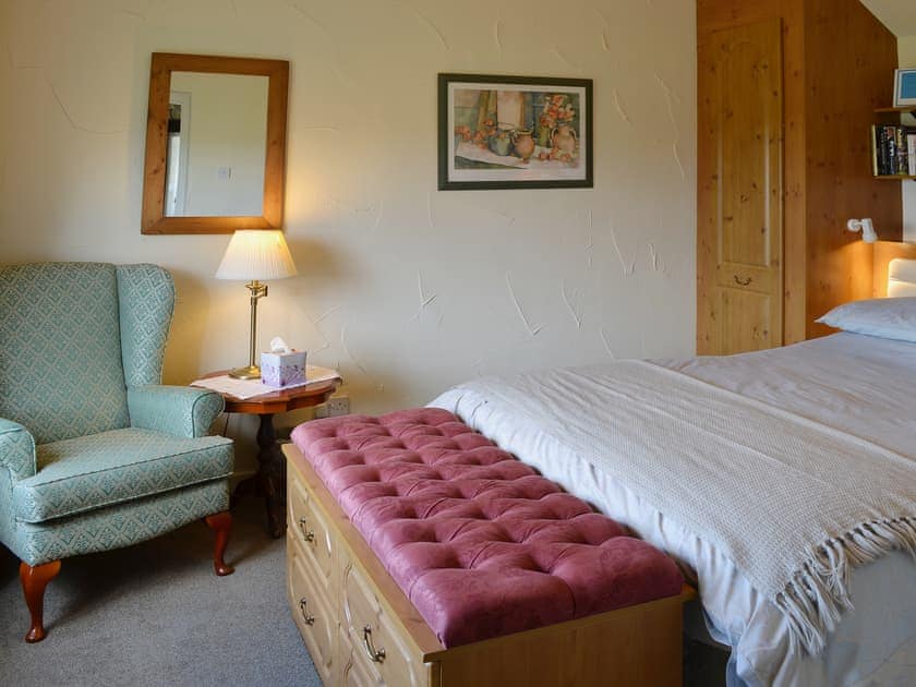 Well furnished and comfortable the double bedroom makes a perfect place to unwind after a day exploring the local area | Garden Cottage, Edlingham, near Alnwick