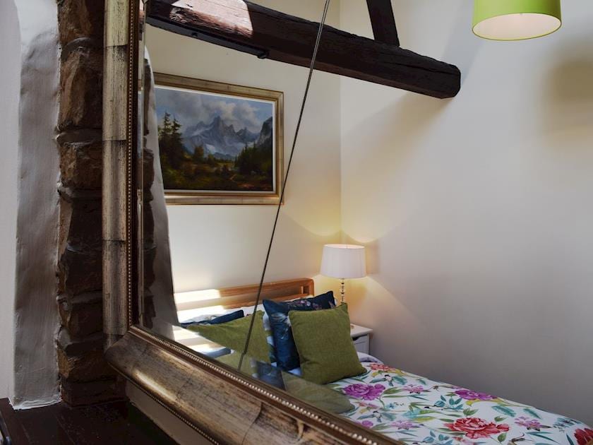 The exposed beams and trusses remind guests of the historic aspects of the property | Yew Tree Cottage - River Nene Cottages, Water Newton, near Peterborough