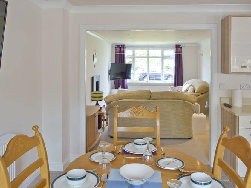 Light and airy dining space in large kitchen | Smitten Cottage, Rhyl