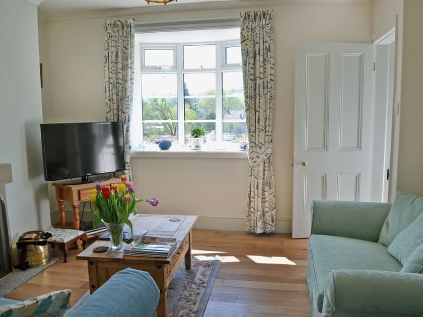 Beautifully designed living room with woodburner | Bumblebee Cottage, Marske near Richmond