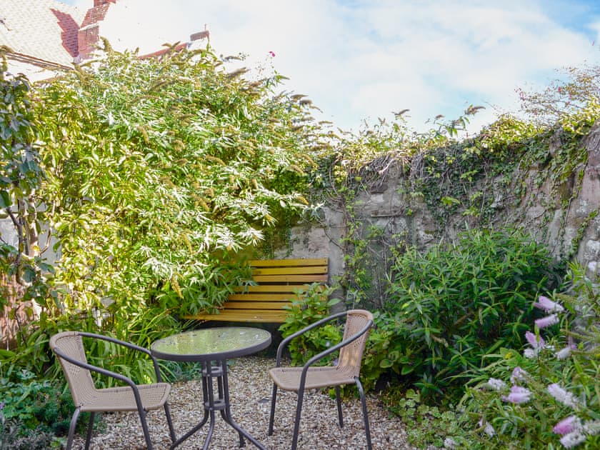 Cosy sitting out area | Next Door Cottage, Holy Island