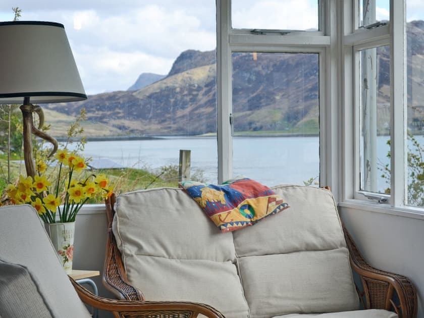 Light and airy sun room | Loch Shore Cottage, Dornie, near Kyle