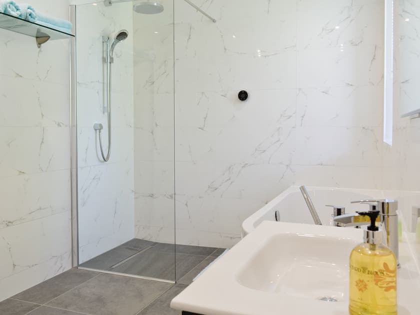 Large family bathroom with separate shower area | St John The Baptist Mission Church, Capel Curig