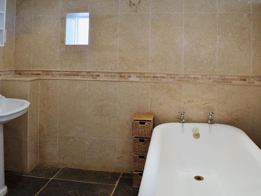 Stylish elegant bathroom boasting a roll top bath and shwer wet area | Brook Barn - Brook and Meadow Barns, Shobley, Ringwood