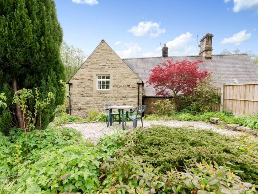 Exterior with sitting out area | Brookside Cottage, Beeley, near Chatsworth