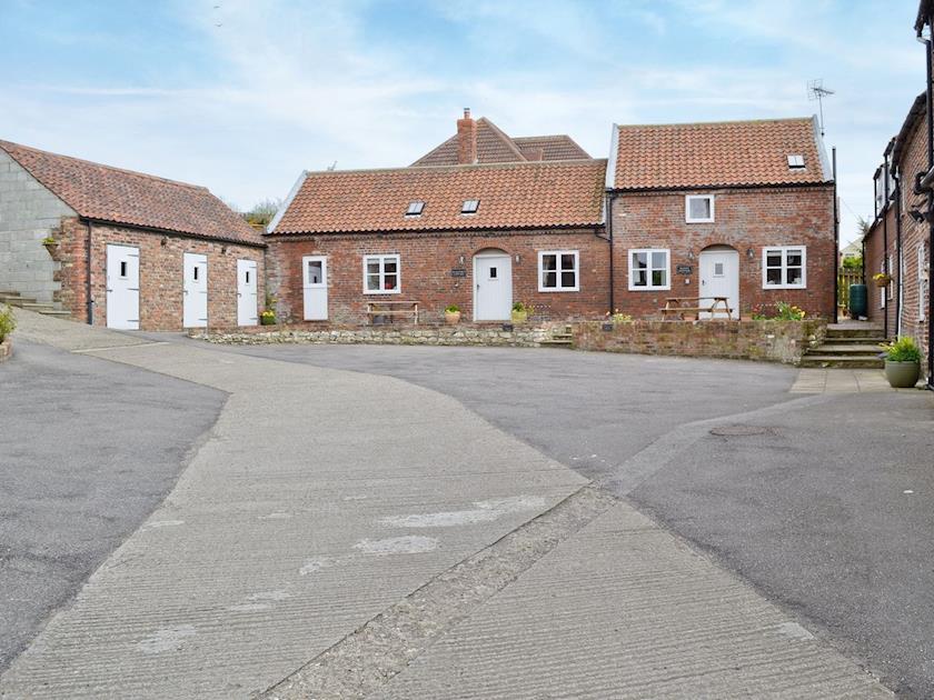 Exterior and grounds of the property | Guillemot Cottage - Manor Farm Cottages, Buckton, near Flamborough