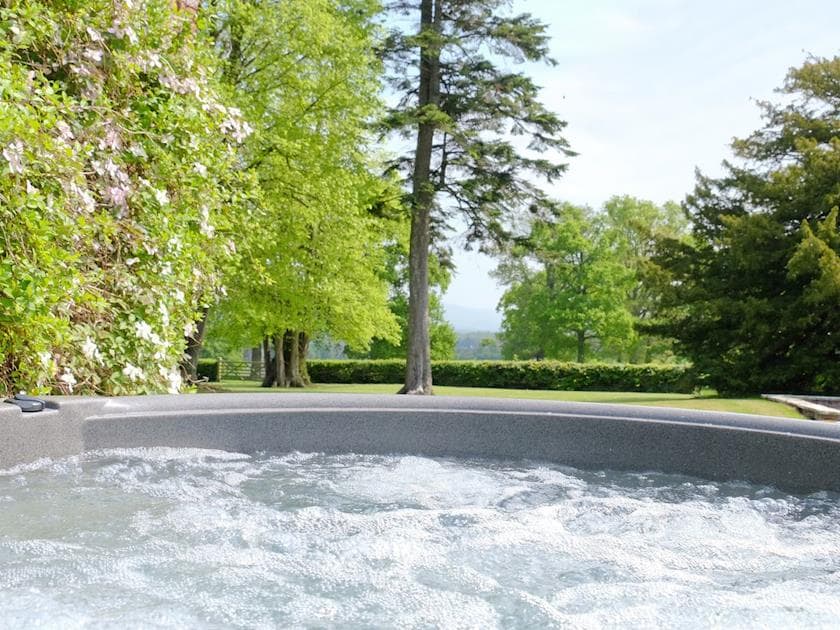 Relaxing hot tub in scenic setting | Summer House, St Asaph
