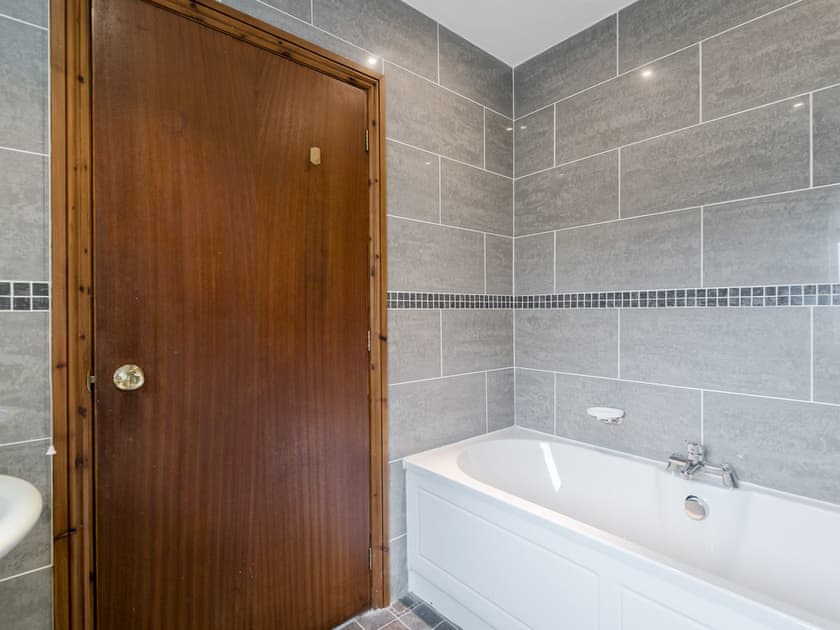 En-suite bathroom | Oaklands, Langrigg, near Cockermouth