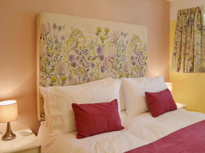 The double bedroom is furnished using sumptuous Voyage fabrics | Tamar Ten, St Ann’s Chapel, near Callington