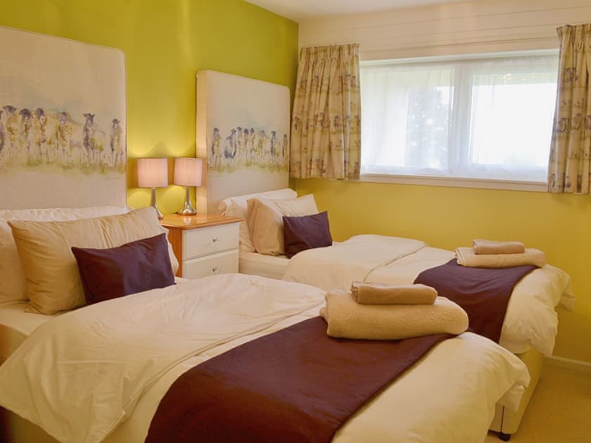 The twin room has matching upholstered bed-heads | Tamar Ten, St Ann’s Chapel, near Callington