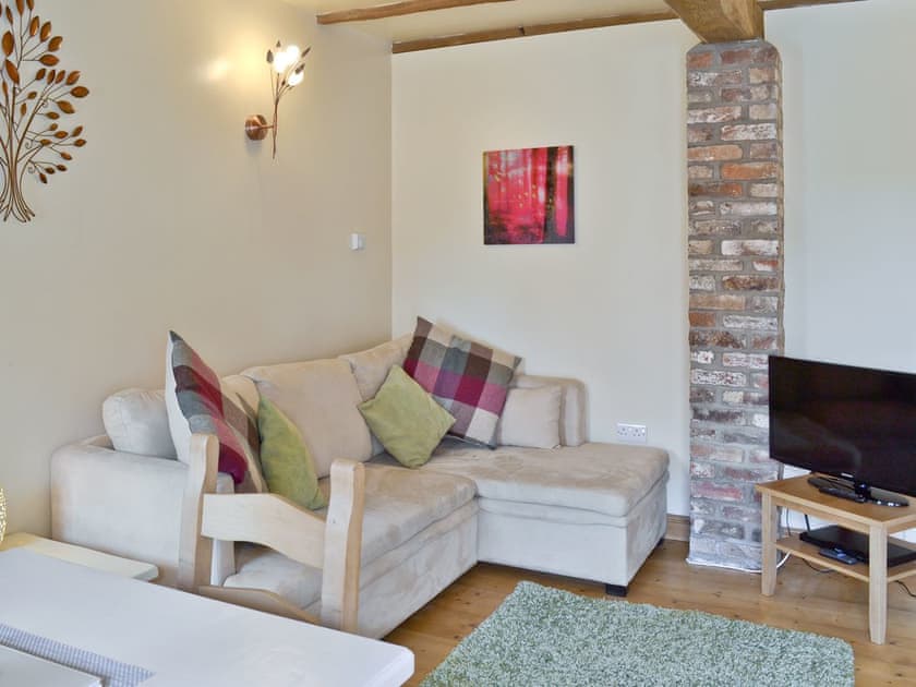 Comfy seating in lounge area | Puffin Cottage - Manor Farm Cottages, Buckton, near Flamborough