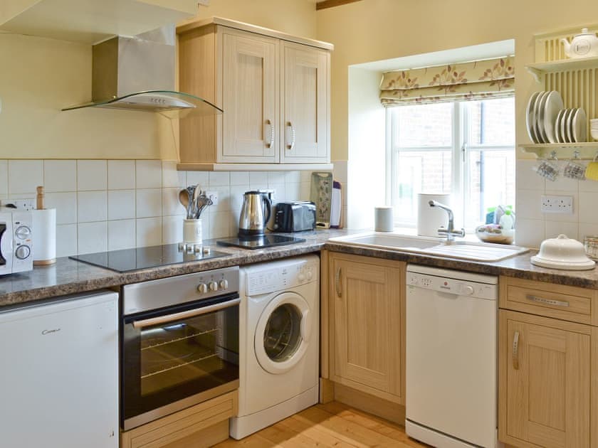 Well-appointed kitchen area | Puffin Cottage - Manor Farm Cottages, Buckton, near Flamborough