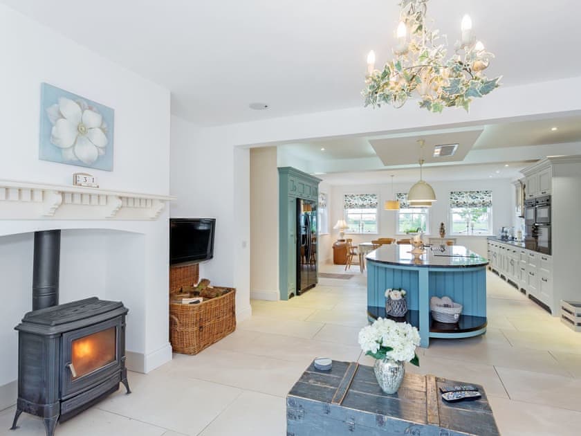 Impressive kitchen with woodburner and sittiing area | Yokefleet Cottage, Sandholme, near Beverley